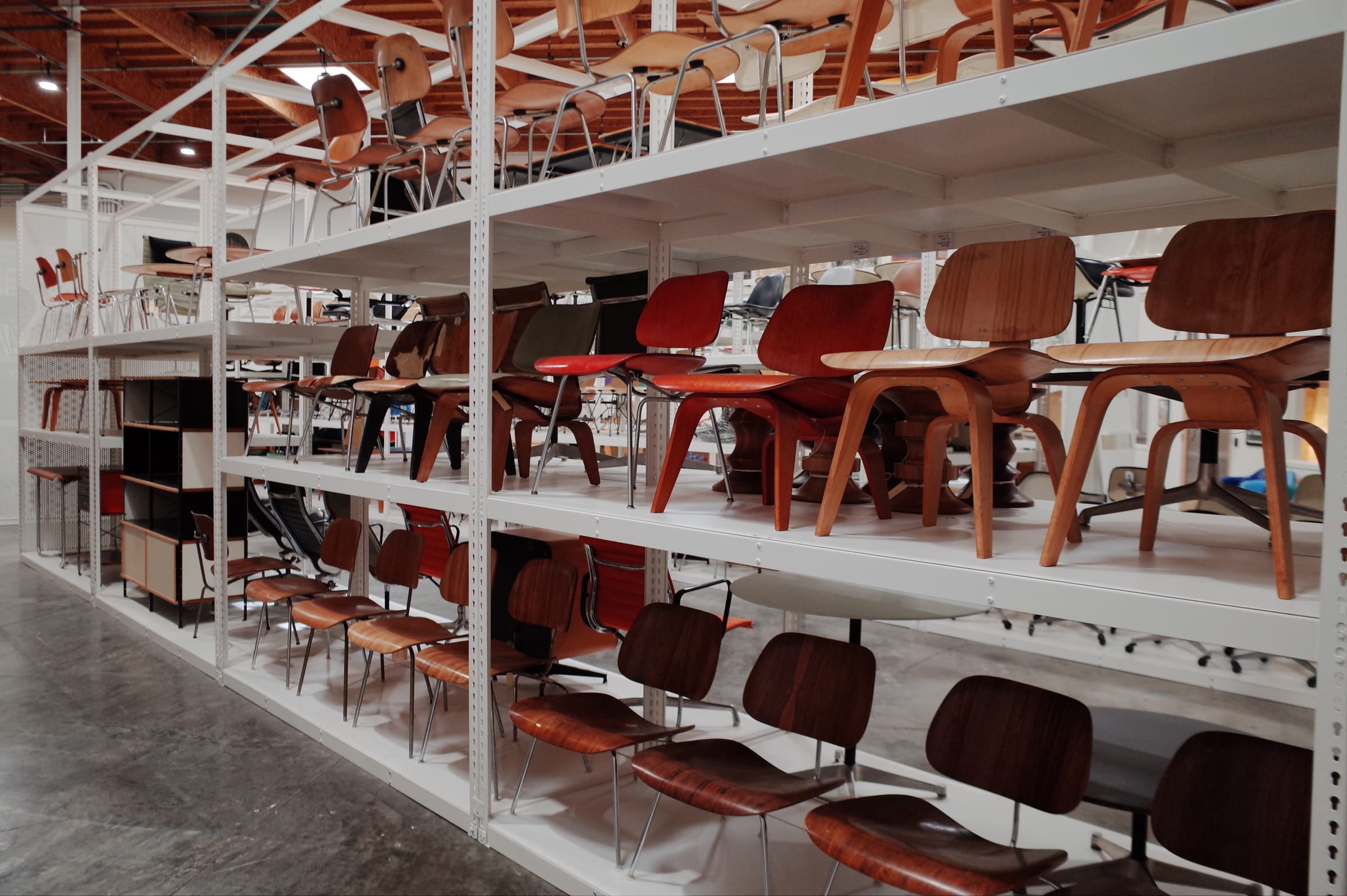 Rows of molded plywood chairs